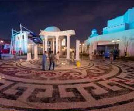 Greek-themed plaza with mosaic paving at Boulevard World