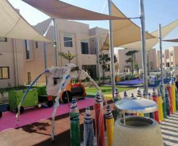 Shaded play area at Nesaj Housing Compound